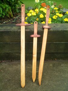 Picture of three wood swords I made